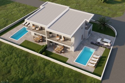 Una casa bifamiliare con piscina in posizione tranquilla a poca distanza dal mare e dal centro - nella fase di costruzione