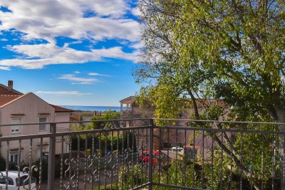 Casa con due appartamenti e un bel curato cortile 34