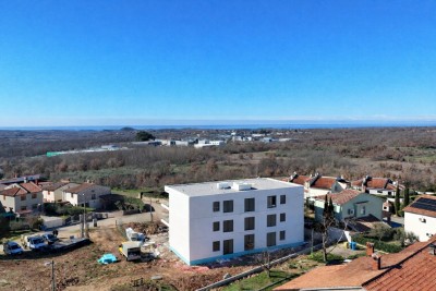 Modern apartment on the 1st floor with a large terrace and sea view - under construction 4