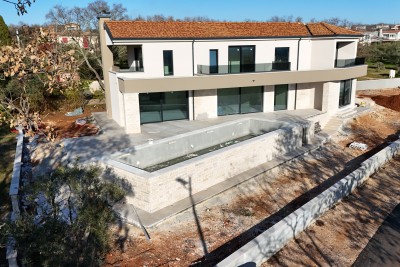 A beautiful modern villa in a quiet location with a sea view - under construction 3