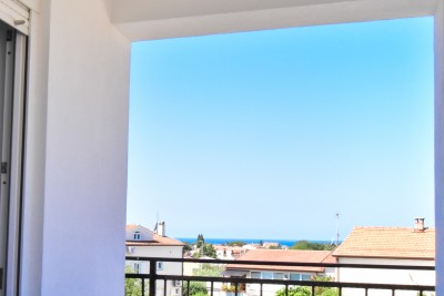 Dvoetažni stan s panoramskim pogledom na more i garažom 13