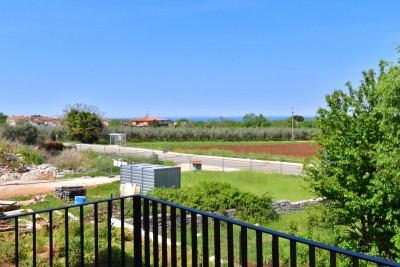 Dvoetažni stan s balkonom i pogledom na more 8