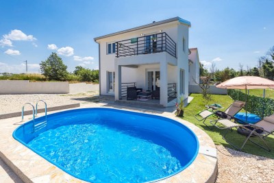 A new furnished house with a swimming pool in a quiet location near Poreč