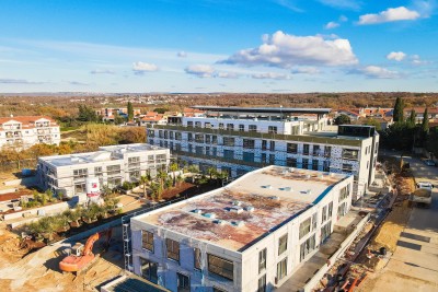 Modern penthouse with roof terrace and swimming pool near the beach and the center of Poreč - under construction