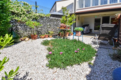 Prostran stan u prizemlju s dvije spavaće sobe i vrtom od 150 m² 24