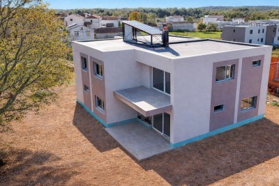 Wohnung im 1. Stock mit Dachterrasse – Moderner Komfort mit Aussicht - in Bau