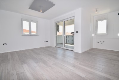 A beautiful three-room apartment in a new building on the second floor
