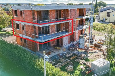 Modern apartment on the 1st floor with a large terrace and sea view - under construction