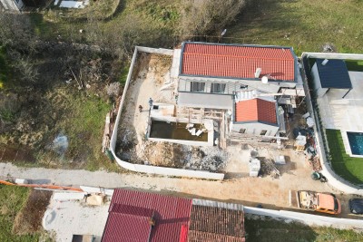 A spacious new villa with a swimming pool in a quiet location - under construction