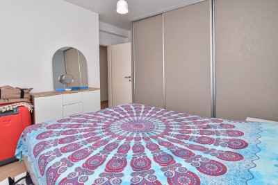 Prostran stan u prizemlju s dvije spavaće sobe i vrtom od 150 m² 15