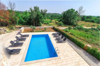 A beautiful stone villa with a swimming pool 2
