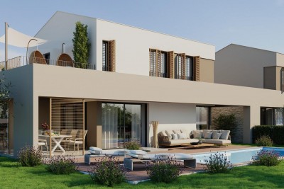 Una moderna casa a basso consumo energetico con piscina attrezzata con mobili di design