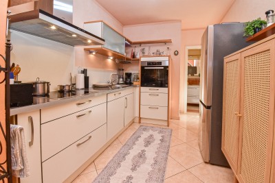 Casa con due appartamenti e un bel curato cortile 10