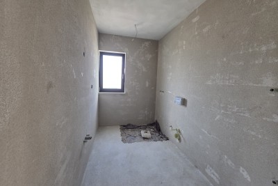 Poreč stan novogradnja 2S+DB, 1.5 km od mora, terasa, parking, podno grijanje - u izgradnji 18