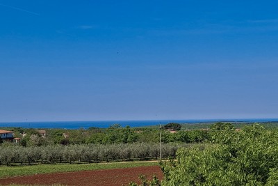 Dvoetažni stan s dvorištem i pogledom na more