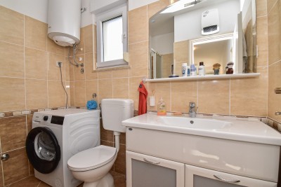 Casa con due appartamenti e un bel curato cortile 27