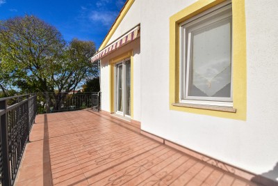 Casa con due appartamenti e un bel curato cortile 33