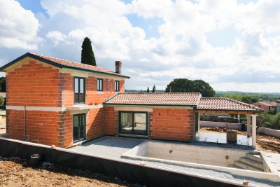 Una villa in pietra autoctona con vista panoramica - nella fase di costruzione 1