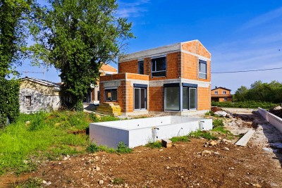 Ein neues Haus mit Schwimmbad in der Nähe von Poreč, nicht weit von Vrsar