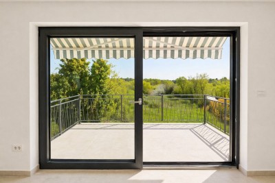 Vierzimmerwohnung im ersten Stock mit eigener Terrasse