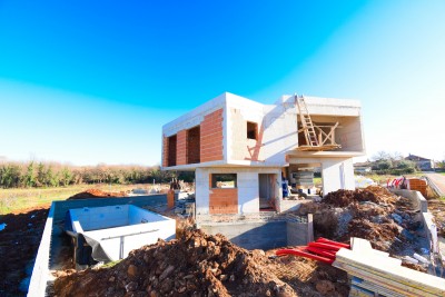 An unusual designer house with a swimming pool in an idyllic location - under construction 6