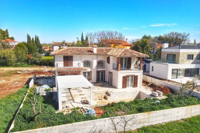 A beautiful villa with a Spanish flair located in a quiet location - under construction 13