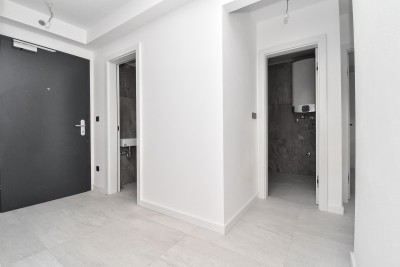 Ekskluzivan stan u centru – 2. kat, lift i garažno mjesto 18