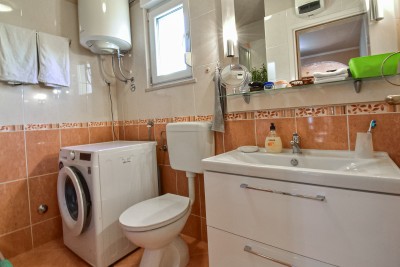 Casa con due appartamenti e un bel curato cortile 14