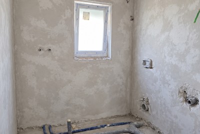 Kuća u nizu s pogledom na more i prostranom okućnicom od cca. 400 m² 10