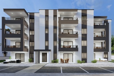 Appartamento con due camere al piano terra con ampio giardino in palazzina moderna - nella fase di costruzione