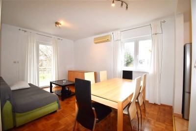 Furnished apartment on the ground floor