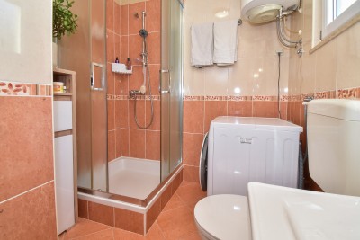 Casa con due appartamenti e un bel curato cortile 15