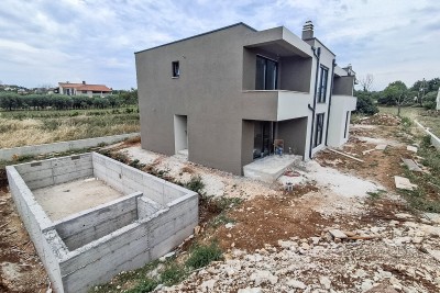 Appartamento al 1° piano con tre camere da letto, giardino privato e piscina condominiale - nella fase di costruzione 4