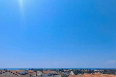 Appartamento su due piani con vista panoramica sul mare e garage