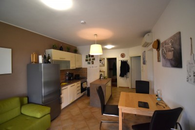 Beautiful furnished apartment on the ground floor in a quiet location with nice land 10