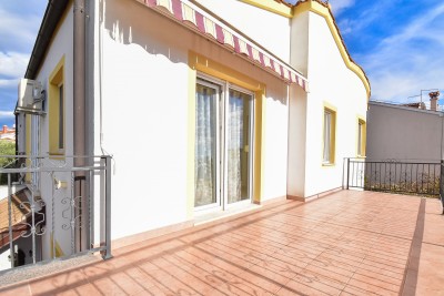 Casa con due appartamenti e un bel curato cortile 32