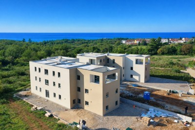 Modernes Penthouse mit Panoramablick auf das Meer und die Stadt - in Bau